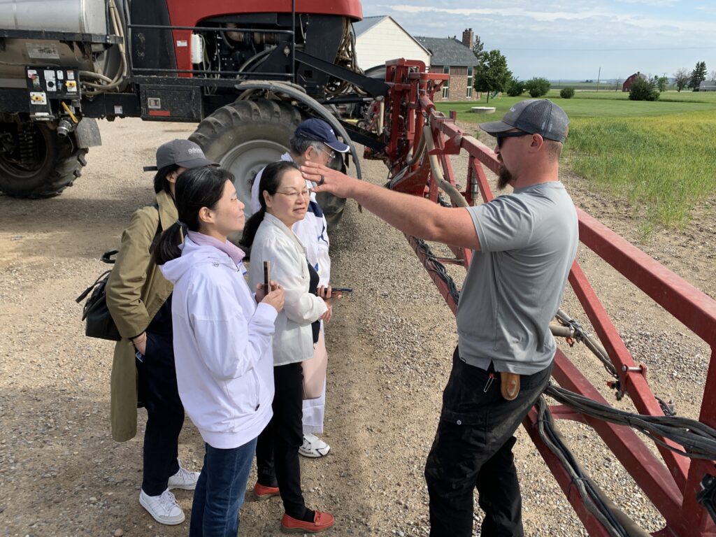 Taiwan Trade Team talking with farmer